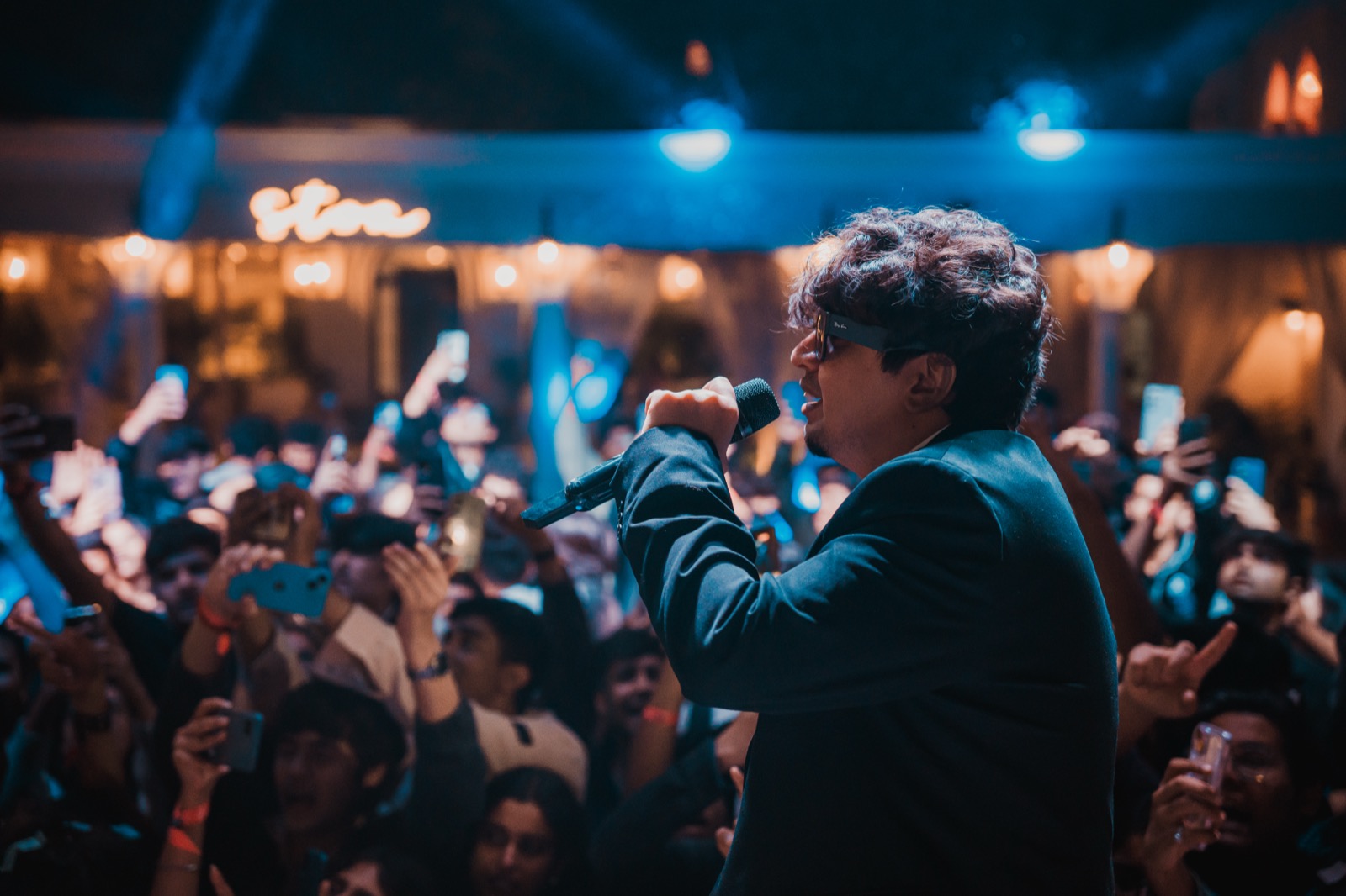 Performer facing crowd